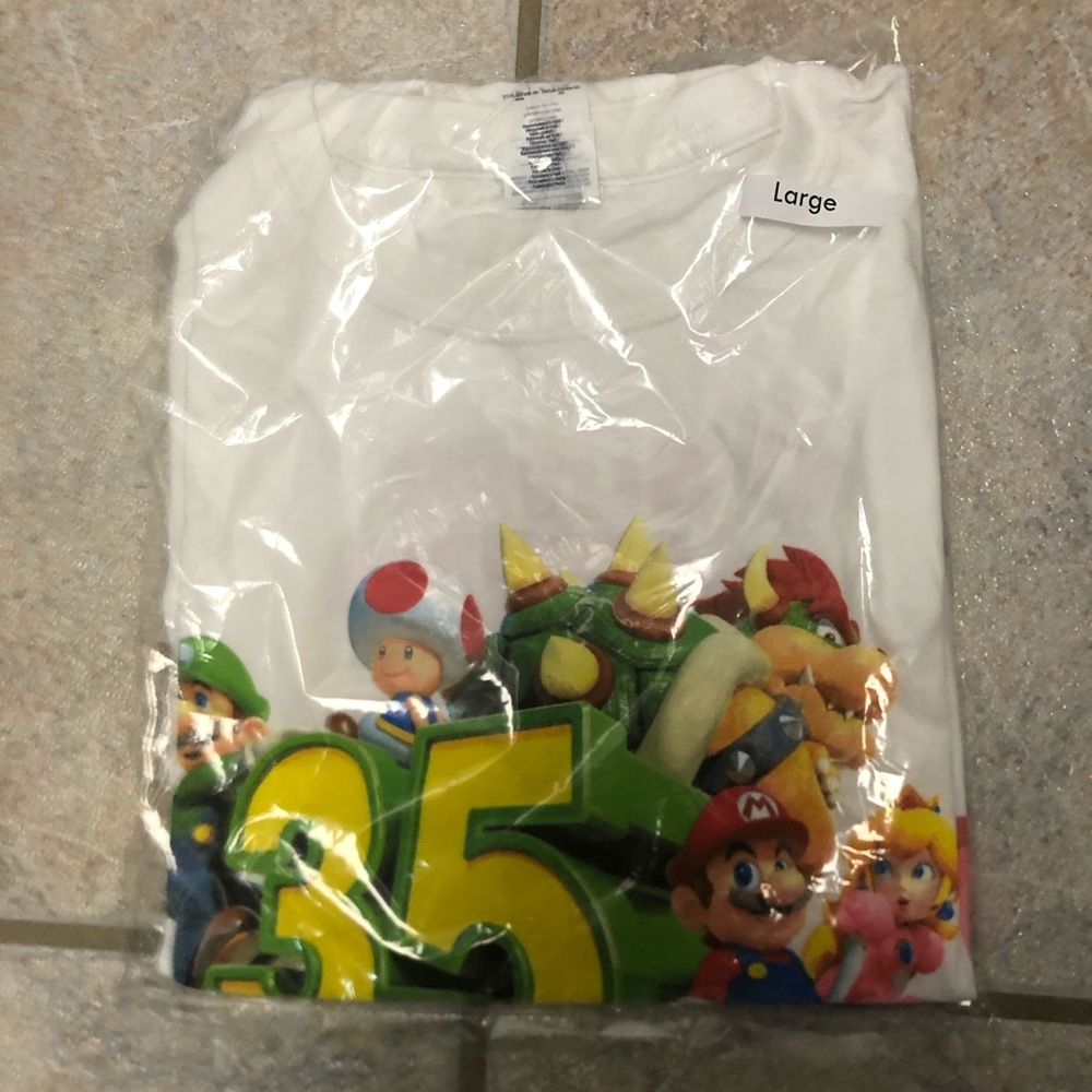 Super Mario 35th anniversary employee tee.
